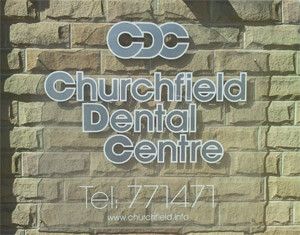 a sign outside the building reading 'Churchfield Dental Centre'